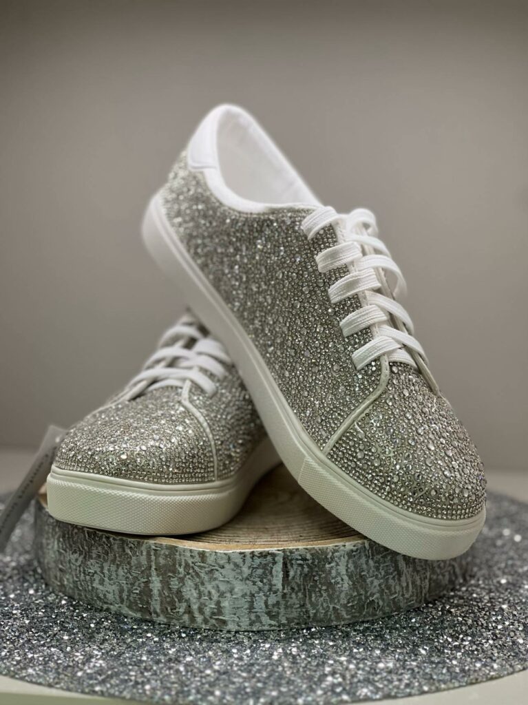 Pair of grey, rhinestone, converse comparable wedding dress shoes from Mirror Mirror in Baldwinsville, NY.